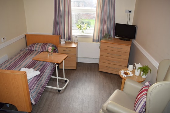 Bed and cupboard with Television