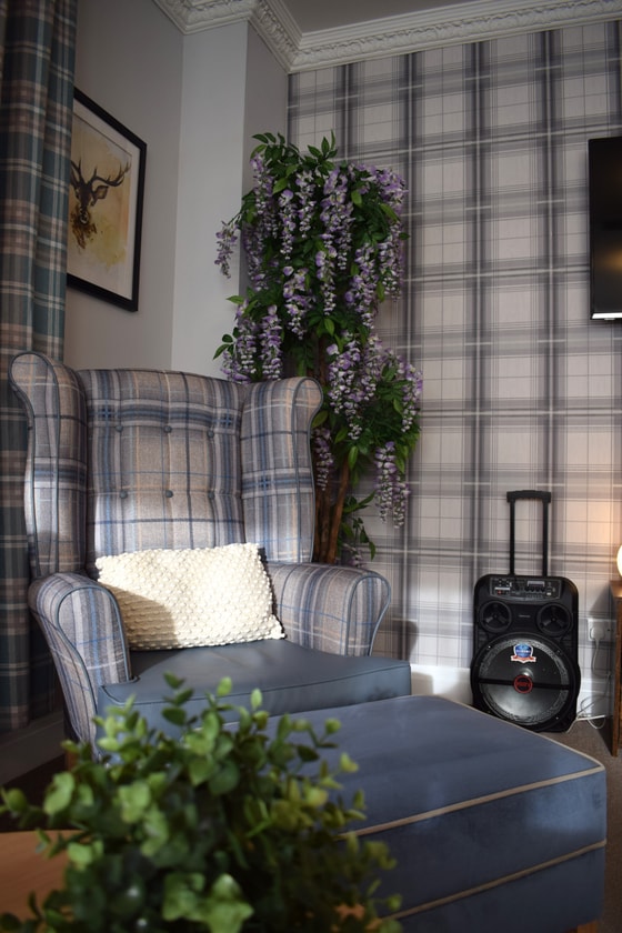 Speaker and checkered wallpaper