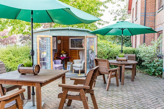 Silverwood Care Home picnic area and garden house