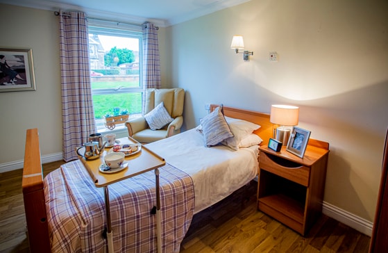 single bed with food tray