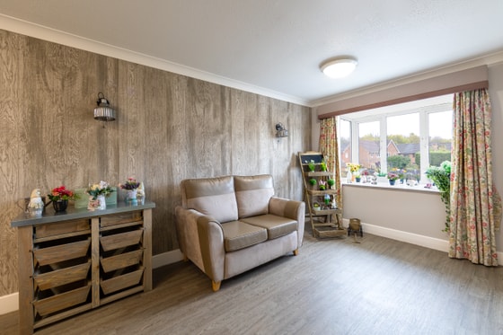 Cream sofa and brown wall