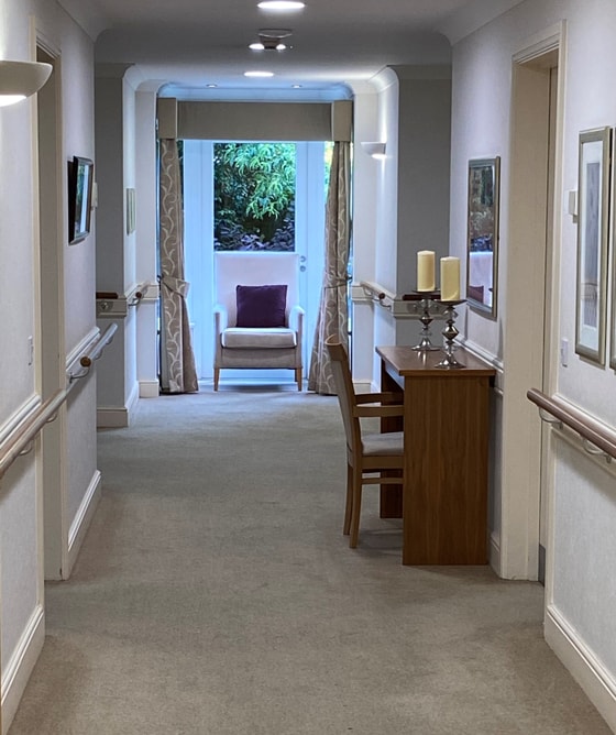 Well lit Corridor with pictures