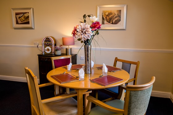 Pink flowers on wooden table