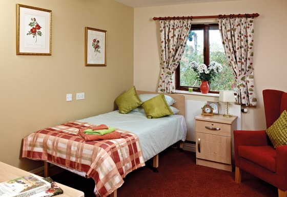 Double bed in senior living room