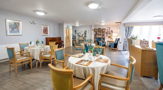 Finavon Court Care Home - Senior living clothed dining 