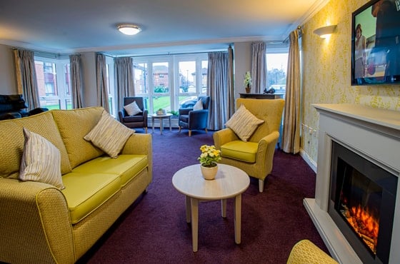 Castle View Care Home - Communal fireplace seating