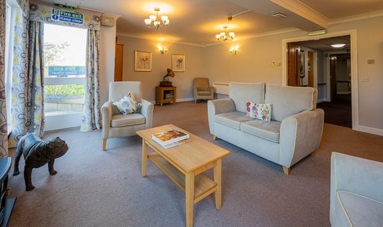 Linlithgow Care Home - Senior living grey sofa