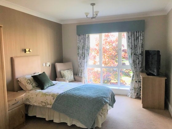 Hawthorn Court Care Home - White and blue double bed