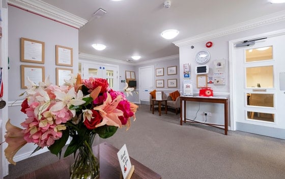 Greenfield Park Care Home - Floral display on wooden table