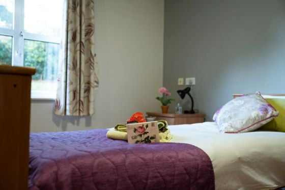 Elstree Court Care Home - Green single bed white walls