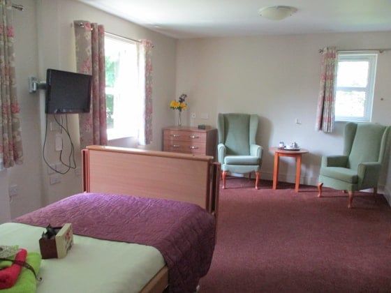 Elstree Court Care Home - Green single bed white walls