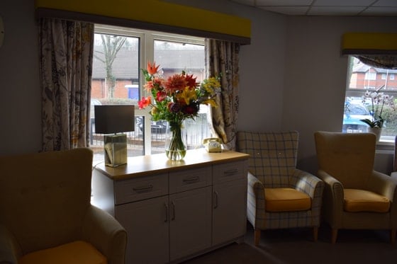 The Daffodils Care Home - Flower and orange seating