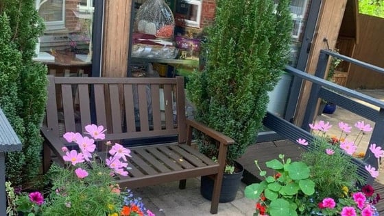 Appleton Lodge Care Home - Senior living wooden bench