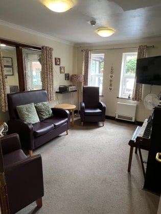 Holmwood Care Home - Small lounge elderly living