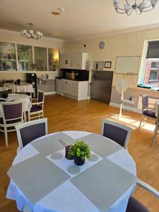 Westleigh Lodge Care Home - Interior communal dinning area