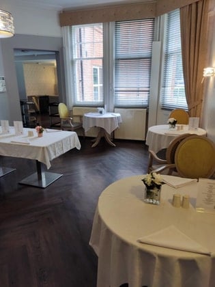 Elstree Court Care Home - White clothed dining area