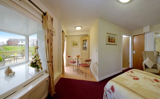 Fir Trees Care Home - Window and seating in bedroom