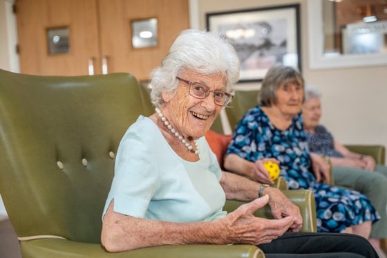 Mountview Care Home - Senior on green arm chair