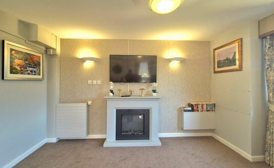 Oakhill House Care Home - Television and golden wallpapeer