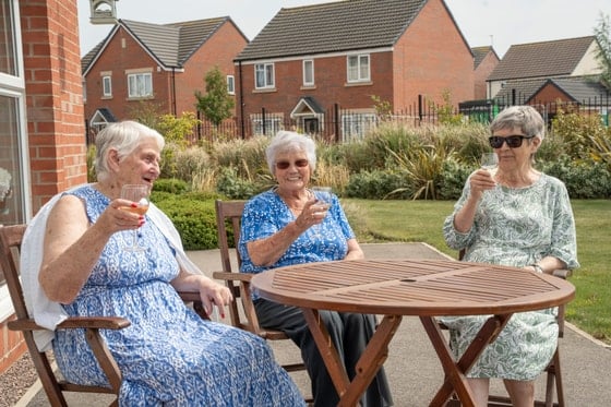 Rivendell View Care Home - Drinking in the sun outside