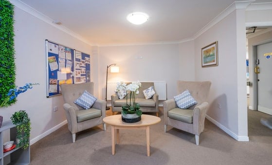 Ailsa Craig Care Home - Grey seating and communal coffee table