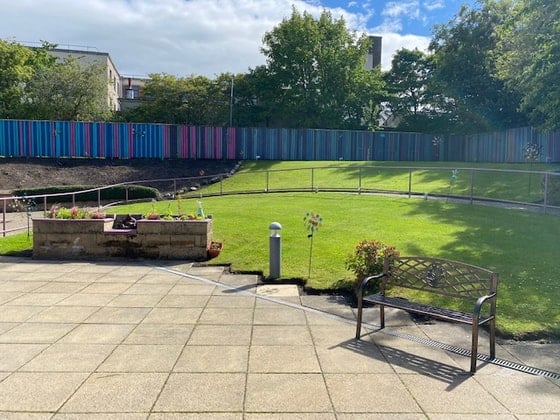 Hamewith Lodge Care Home - Green outdoor seating 