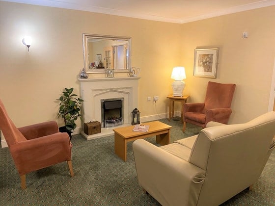 Greenways Court Care Home - Senior living fireplace and seating