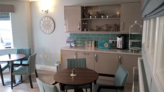 Falstone Court Care Home - Wooden and green chair and table