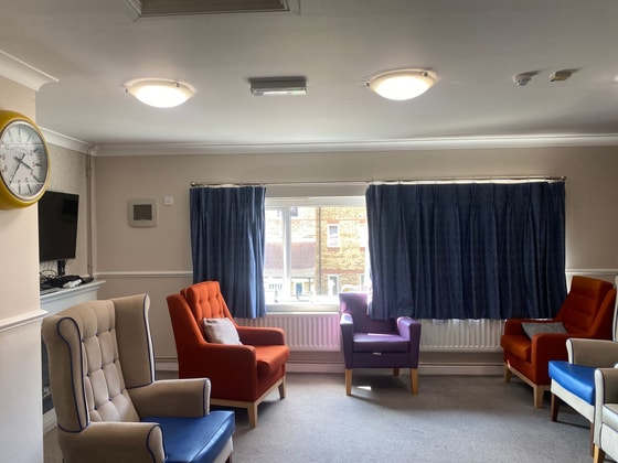River Court Care Home - Blue curtain seating area