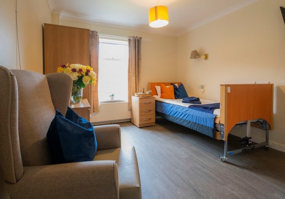 Greenfield Park Care Home - Senior living single blue bed