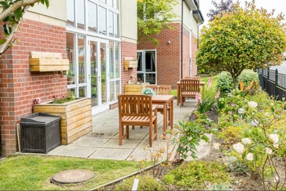 Greenways Court Care Home - Green outdoors and wooden 