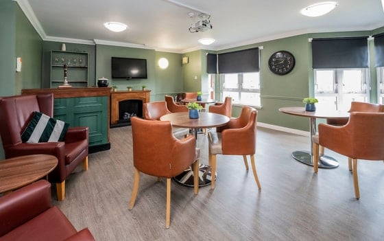 Highgate Care Home - Communal orange chair seating