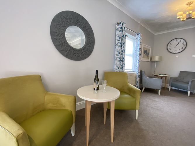 Plas Cwm Carw Care Home - Plas Cwm Carw sitting area with chairs