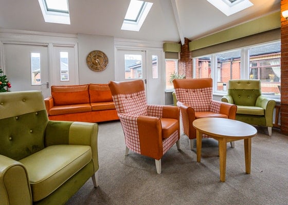 Greenfield Park Care Home - orange and plaid green seating