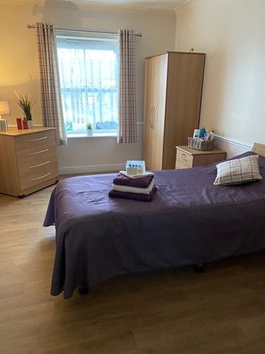 Dovedale Court Care Home - Purple bed with cupboard