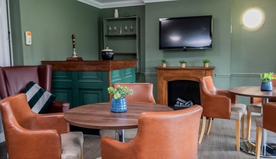 Highgate Care Home - Communal bar and television
