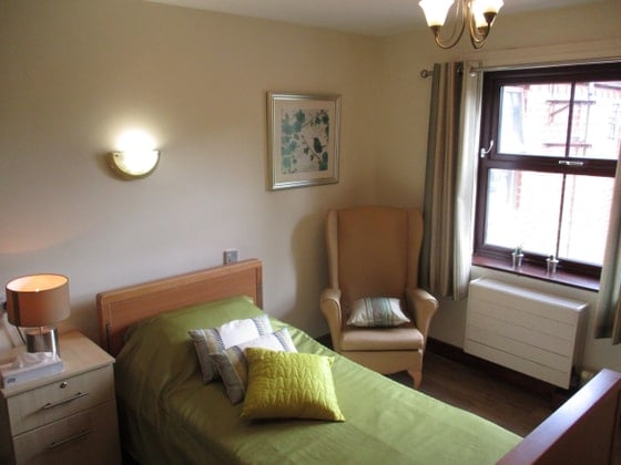 Holmwood Care Home - Green single bed and chair