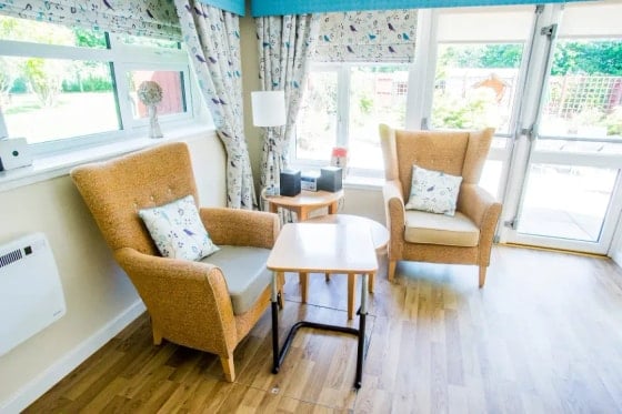 Cairnie Lodge Care Home - Senior Living orange armchairs