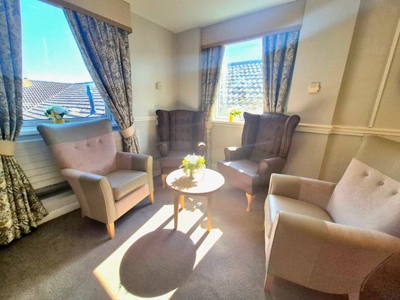 Oakhill House Care Home - Brown chair and coffee table