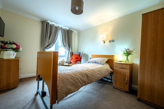 Tranent Care Home - Senior living wooden bed