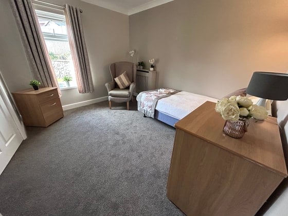 Winters Park Care Home - Senior single white bed