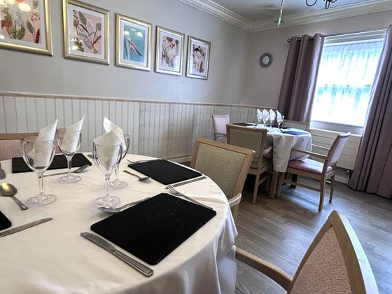 Victoria House Care Home - White clothed dining tables