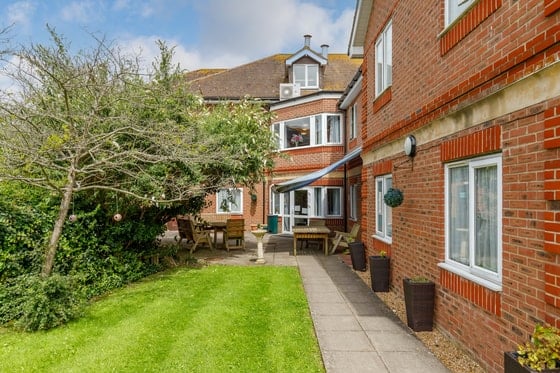 The Polegate Care Home - Stone path and trees