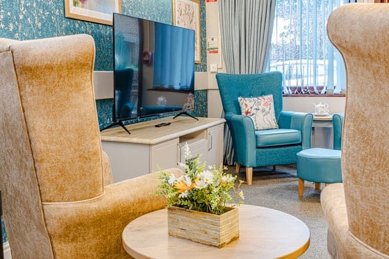 Silverwood Care Home - Silverwood Care Home living area with tv