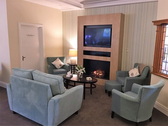 Clarendon Hall Care Home - Blue armchair and television