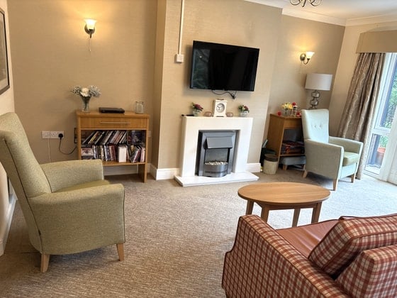 Sutherland Court Care Home - Senior living room checkered sofa