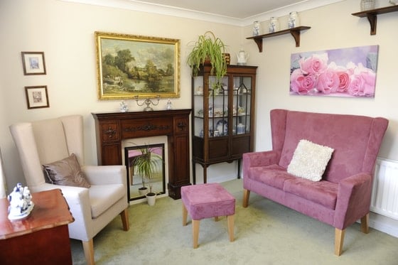 Admirals Reach Care Home - Sitting area, pink chair