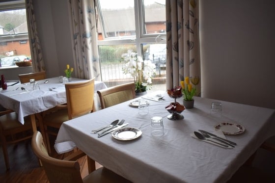 The Daffodils Care Home - White cloth dining table