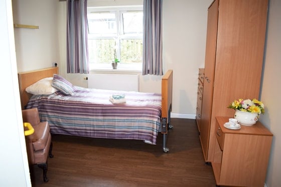 Aberpennar Court Care Home - purple bedroom