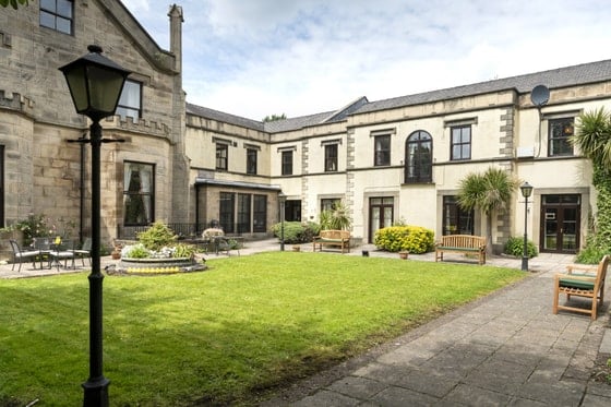 Pendleton Court Care Home - Exterior courtyard with lights